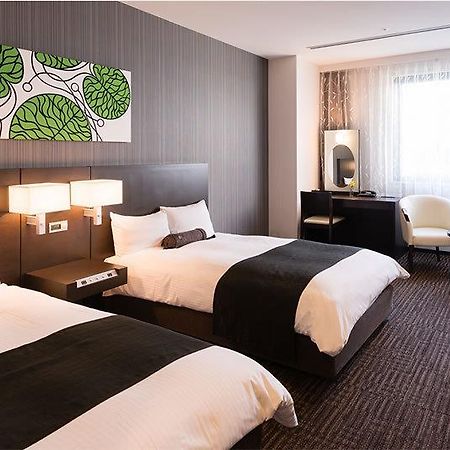 Osaka Airterminal Hotel โทโยนากะ ภายนอก รูปภาพ